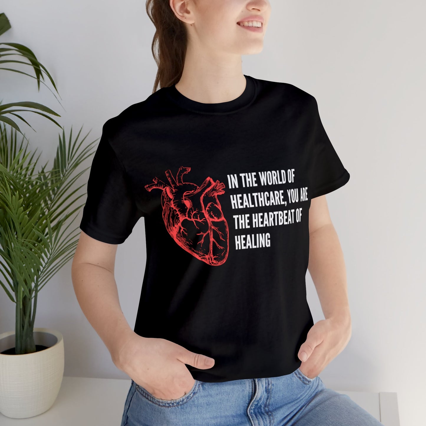 In the world of healthcare, you are the heartbeat of healing Unisex Jersey Short Sleeve Tee