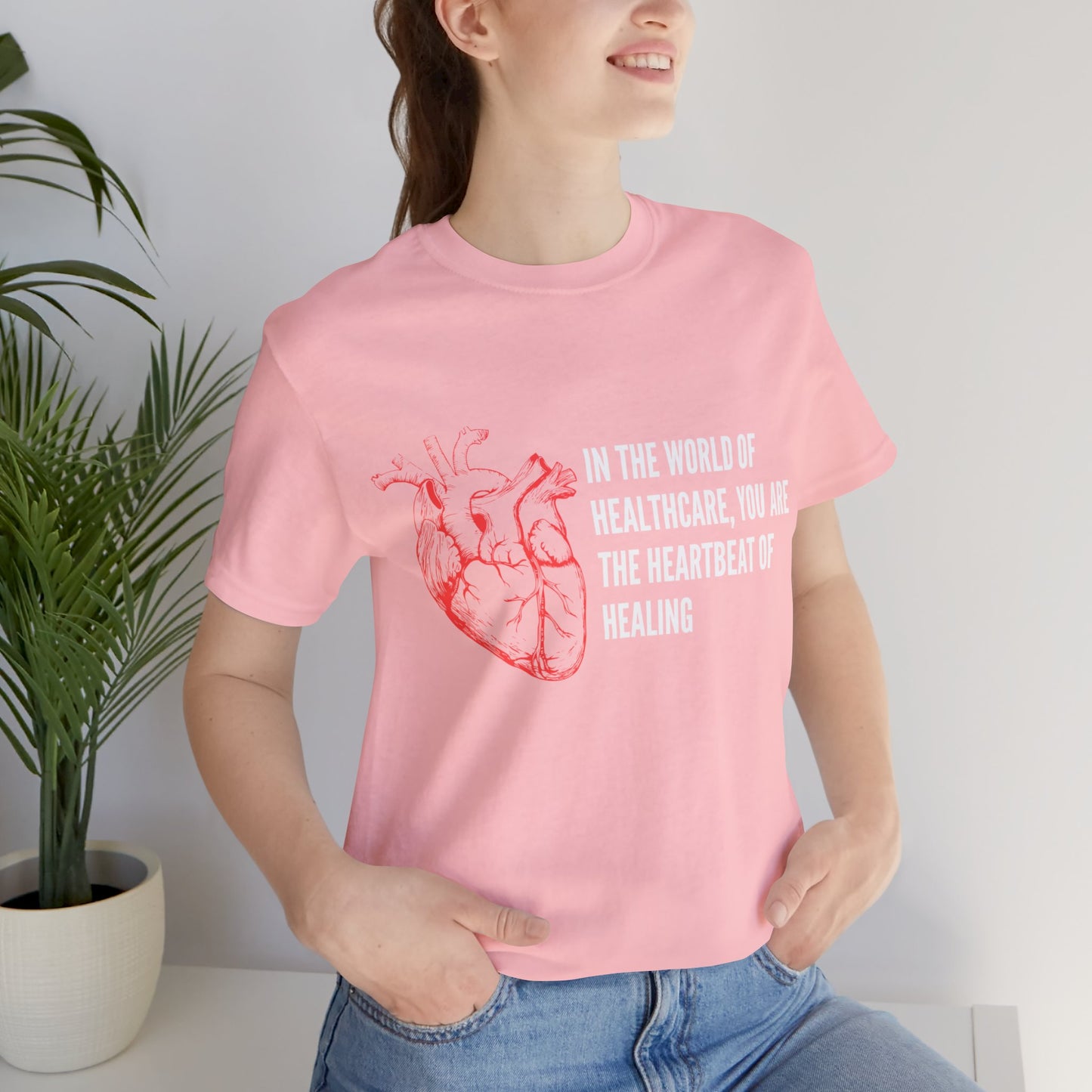 In the world of healthcare, you are the heartbeat of healing Unisex Jersey Short Sleeve Tee