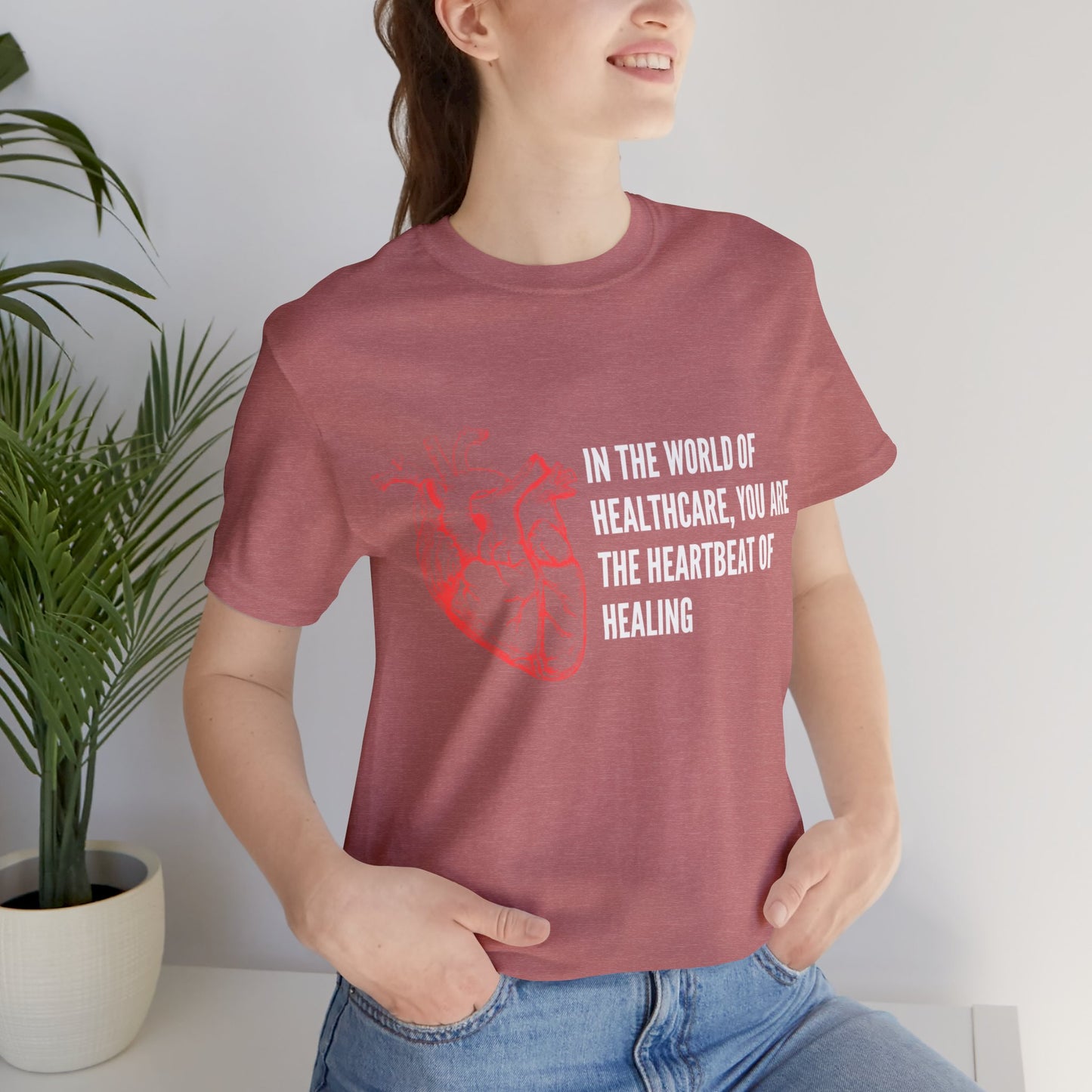 In the world of healthcare, you are the heartbeat of healing Unisex Jersey Short Sleeve Tee